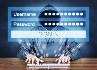 Hacker sitting at computer with password screen
